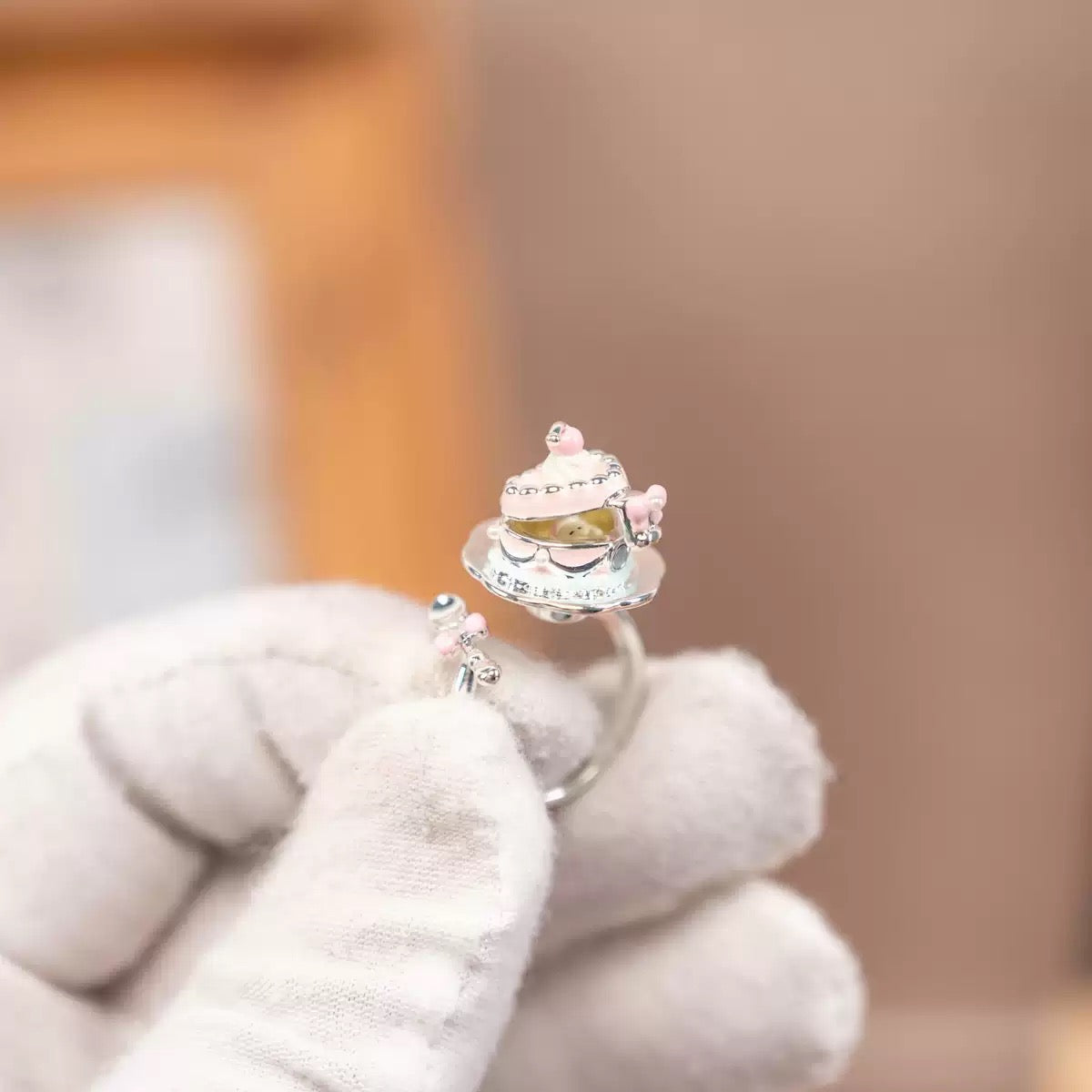 Sterling Silver Cream Cake Swivel Ring